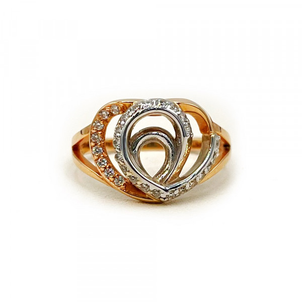 Золотое кольцо красного с белым цвета с цирконом