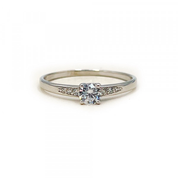 Золота каблучка білого кольору з цирконом