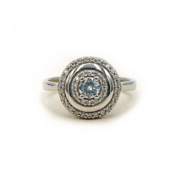 Кольцо из золота белого цвета с цирконом