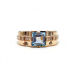 Перстень з золота червоного кольору з блакитним топазом та білими діамантами