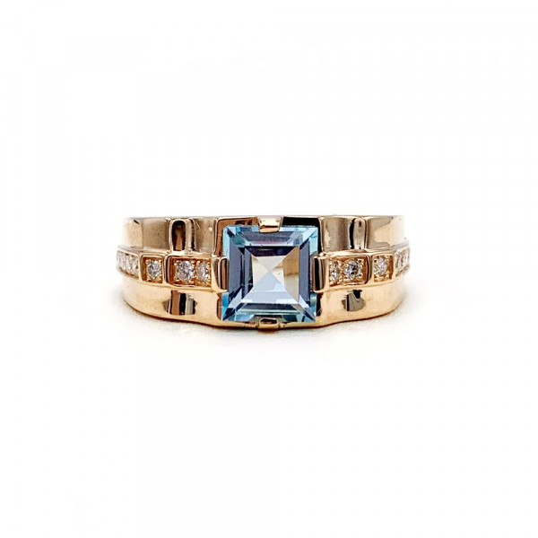 Перстень из золота красного цвета с голубым топазом и белыми бриллиантами