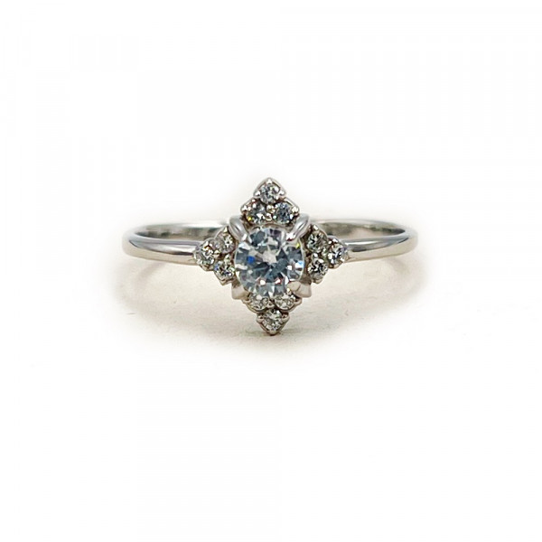 Золота каблучка у білому кольорі з цирконом