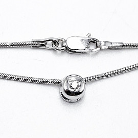 Золотий ланцюг білого кольору з білим діамантом