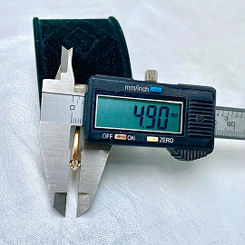 Золота каблучка у червоному з білим кольорі з білим діамантом