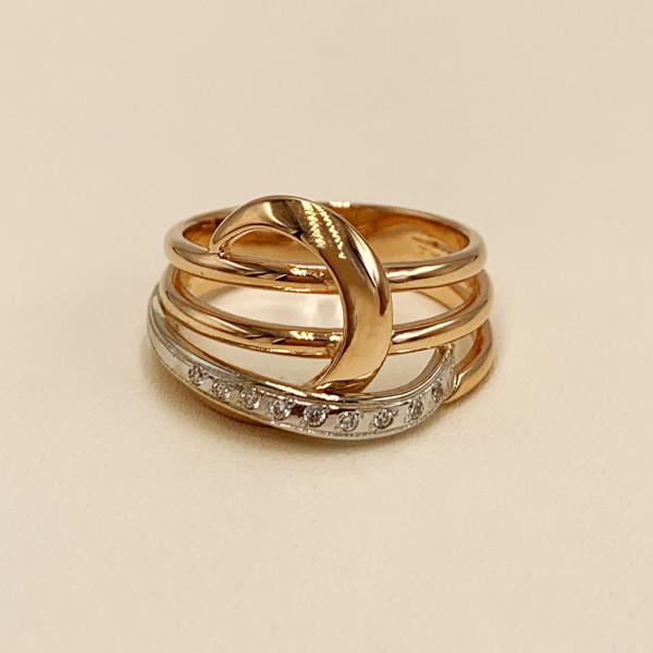 Кольцо из золота в красном с белым цвете с цирконом