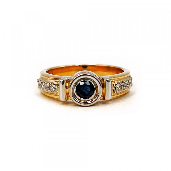 Золотое кольцо с синим корундом и желтыми бриллиантами