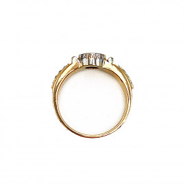 Золотое кольцо с синим корундом и желтыми бриллиантами