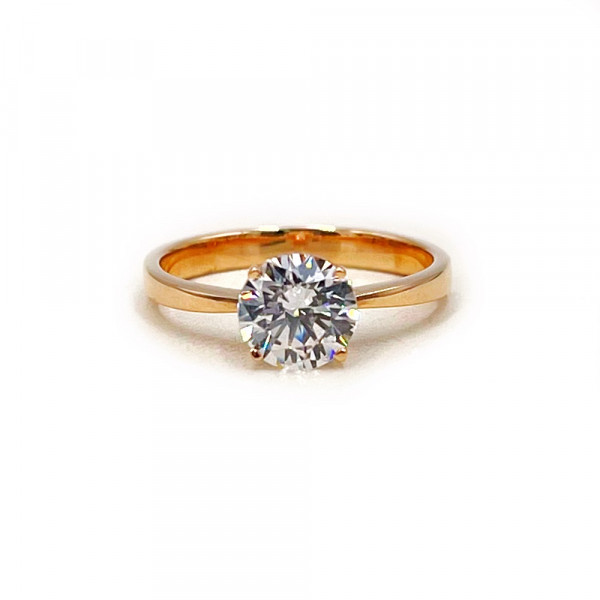 Золотое кольцо красного цвета с цирконом