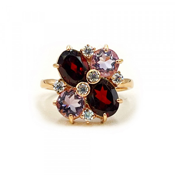 Кольцо из золота красного цвета с коричневыми гранатами и сиреневыми аметистами