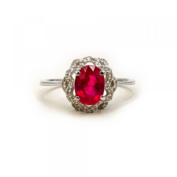 Каблучка з золота з бордовим корундом та жовтими діамантами