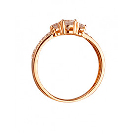 Золотое кольцо красного цвета с цирконом