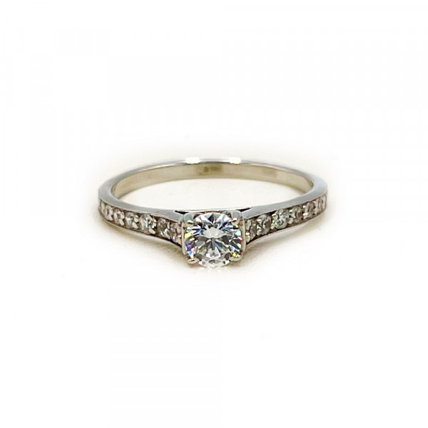 Золота каблучка у білому кольорі з цирконом