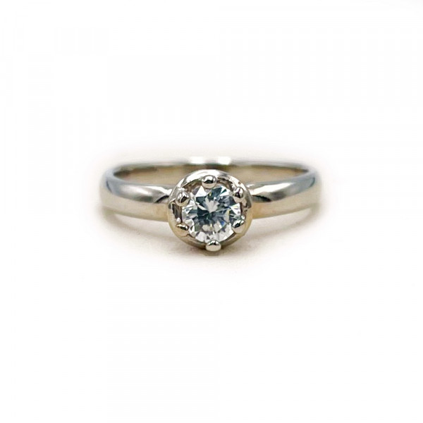 Каблучка з золота у білому кольорі з цирконом