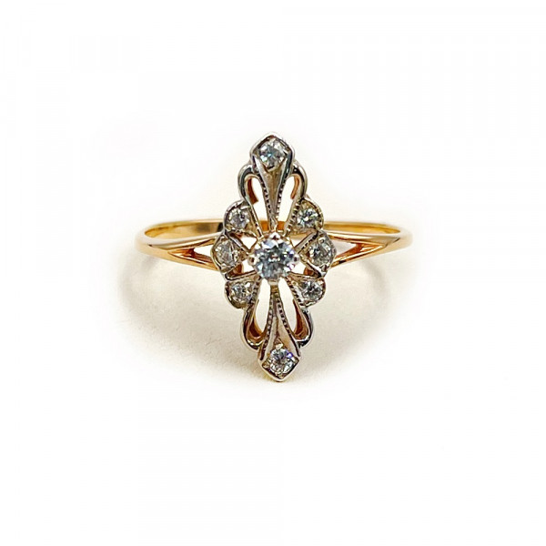 Кольцо из золота в красном с белым цвете с цирконом