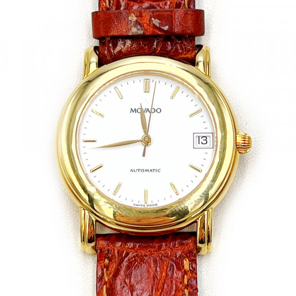 Золотий годинник у жовтому кольорі