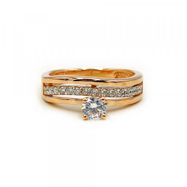 Кольцо из красного с белым золота с цирконом