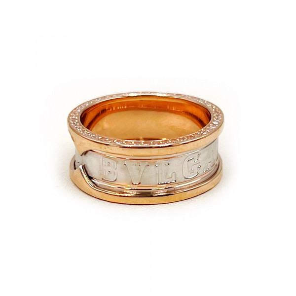 Золотое кольцо в красном с белым цвете с цирконом