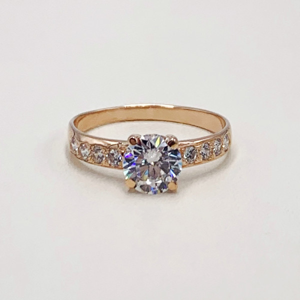 Кольцо из золота с цирконом