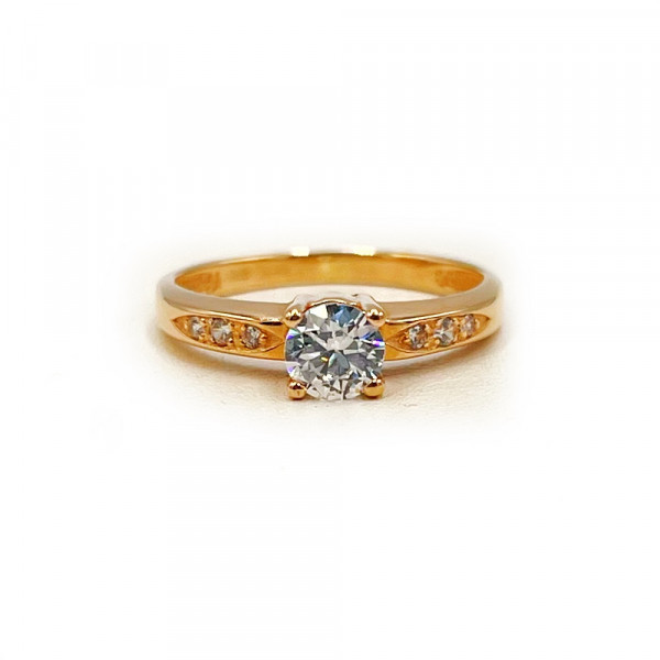 Каблучка з золота червоного кольору з цирконом