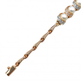 Золотой браслет с жемчугом и цирконом