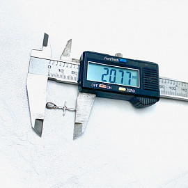 Золотий хрестик у білому кольорі з жовтими діамантами