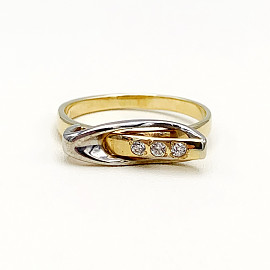 Золотое кольцо желтого с белым цвета с цирконом