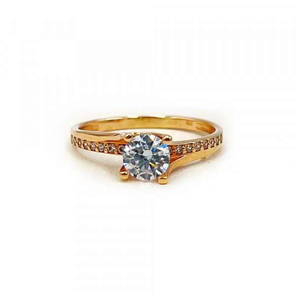 Золотое кольцо красного цвета с цирконом