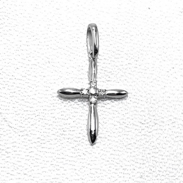 Золотий хрестик у білому кольорі з білими діамантами