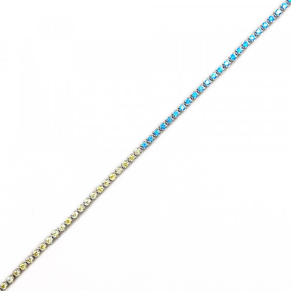 Золотий браслет у білому кольорі з цирконом