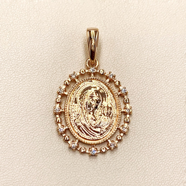 Золотий кулон з цирконом