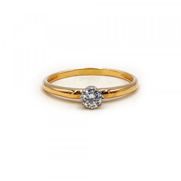 Золотое кольцо красного с белым цвета с цирконом