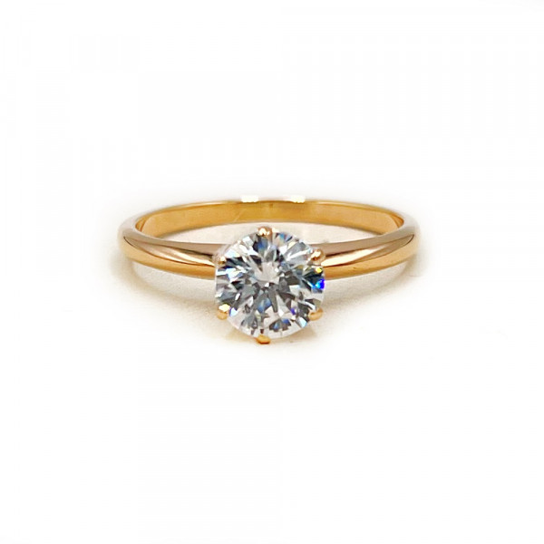 Золотое кольцо красного цвета с цирконом