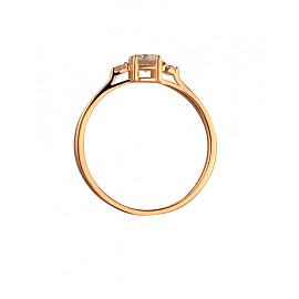 Золотое кольцо красного цвета с цирконом