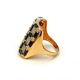 Кольцо из красного с белым золота с цирконом