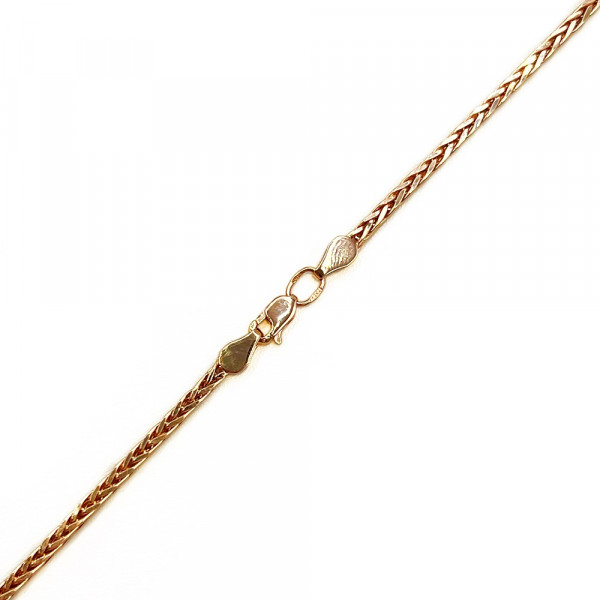 Золотий ланцюг у червоному кольорі