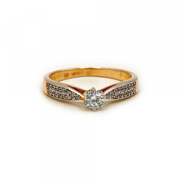 Кольцо из красного с белым золота с цирконом