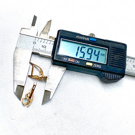 Сережки з червоного золота з блакитними топазами та білими діамантами