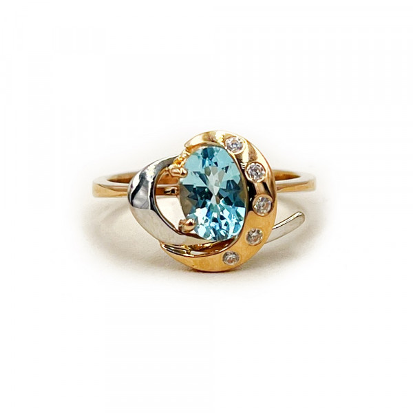 Золота каблучка з блакитним топазом
