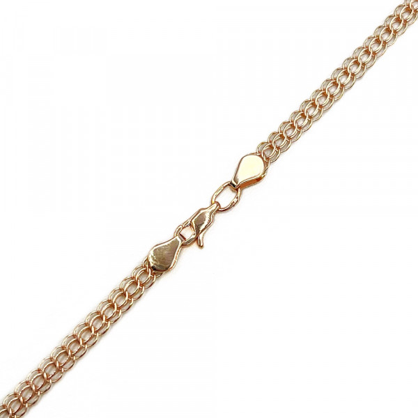 Золотий ланцюг у червоному кольорі