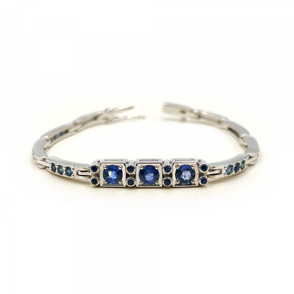 Золотий браслет з синіми корундами