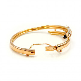 Браслет з червоного з білим золота з жовтими діамантами