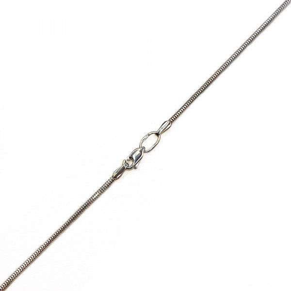 Золотий ланцюг у білому кольорі