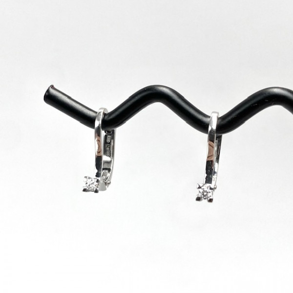 Золоті сережки з білими діамантами