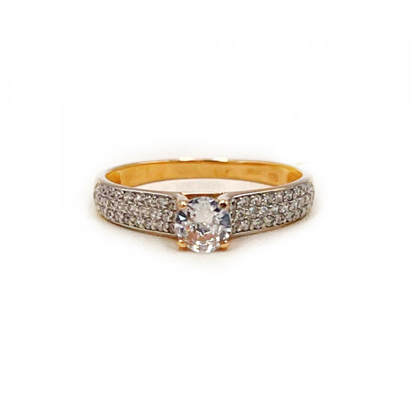 Кольцо из красного с белым золота с цирконом