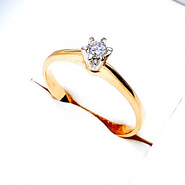 Кольцо из красного с белым золота с белым бриллиантом