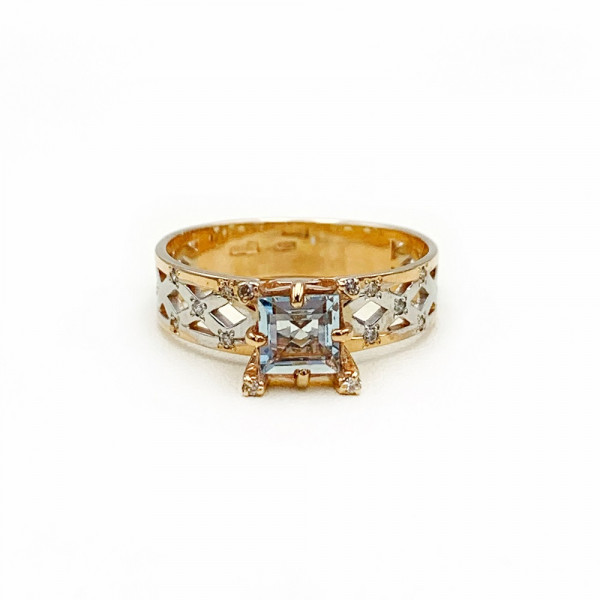 Золотое кольцо красного с белым цвета с голубым топазом и желтыми бриллиантами