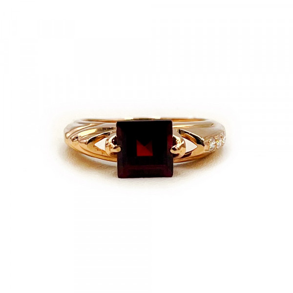 Золота каблучка червоного кольору з коричневим гранатом та цирконом
