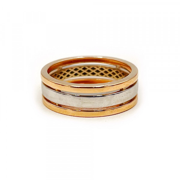 Золота обручка у червоному з білим кольорі