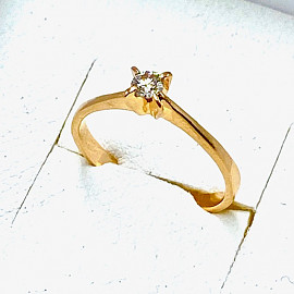 Золота каблучка у червоному кольорі з жовтим діамантом