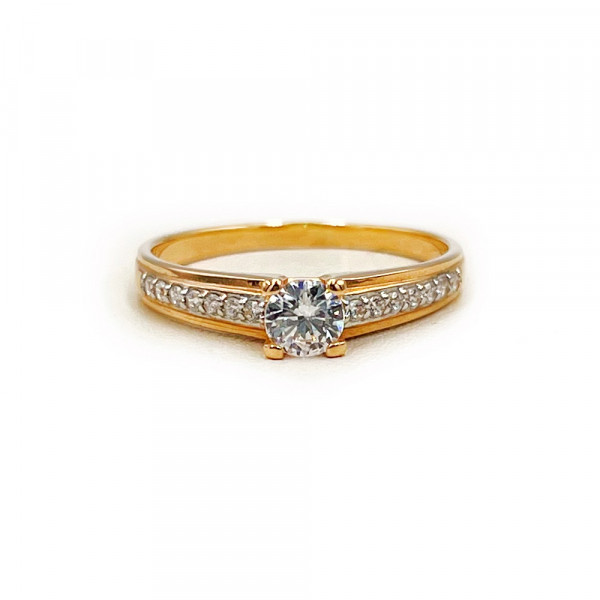 Золотое кольцо красного с белым цвета с цирконом